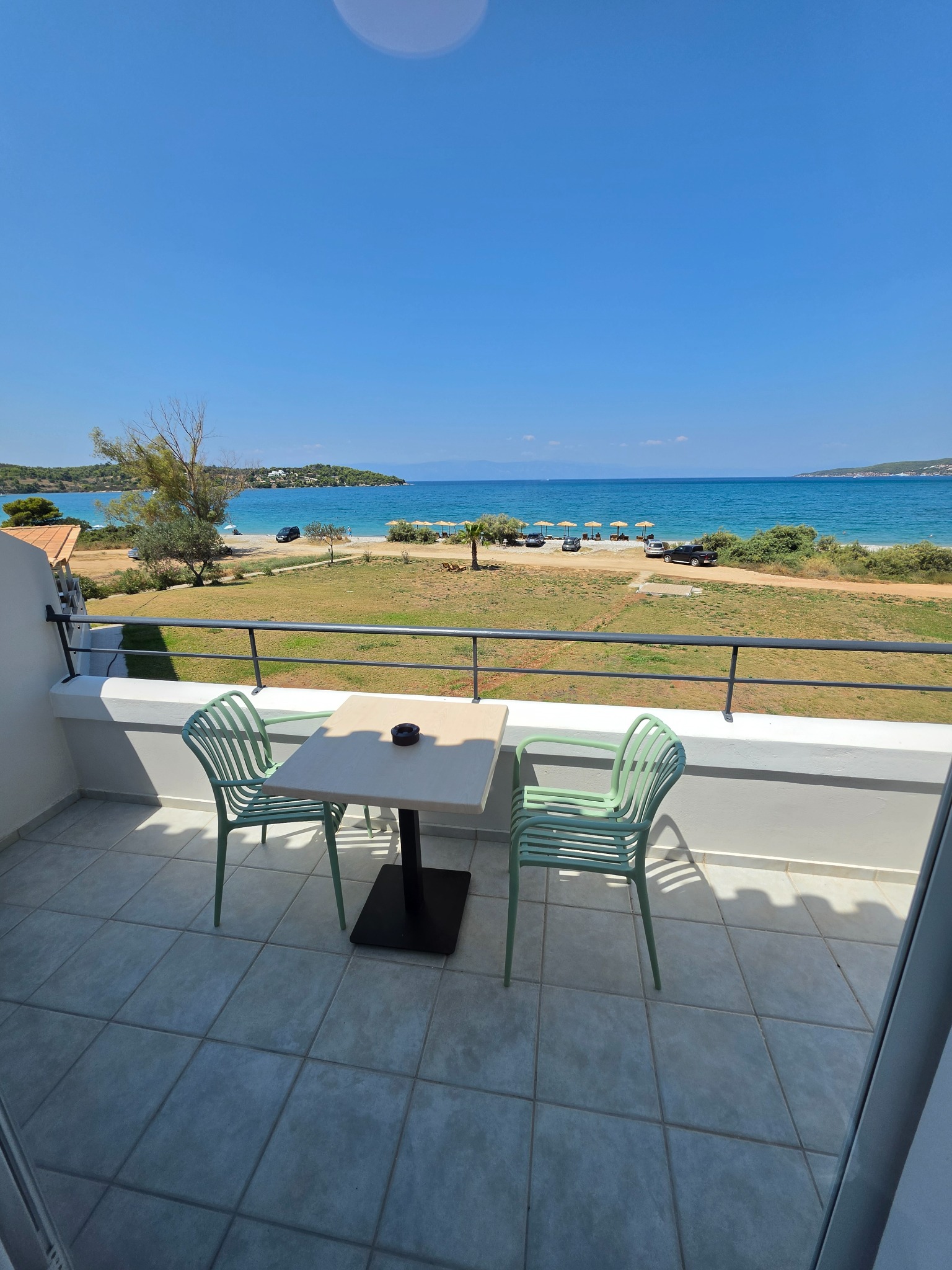 Sea-view balcony at Magenta Beach Suites